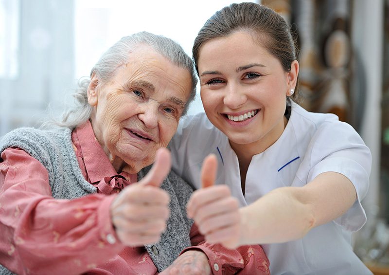 Elderly Woman Giving a Thumbs Up