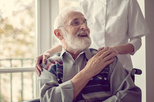 Elderly Man Accepting Help