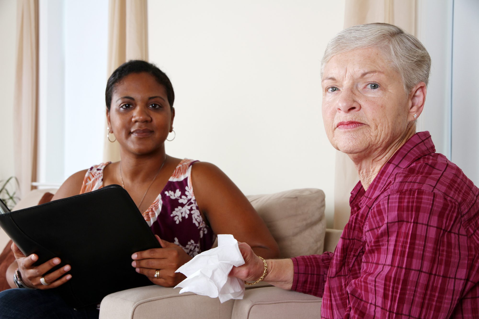 Mental Health Case Manager speaking to an elderly lady