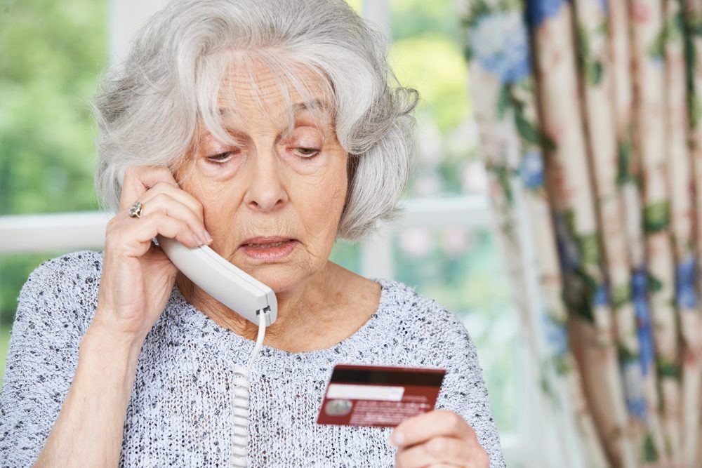 elder fraud, lady with dementia is scammed on the phone