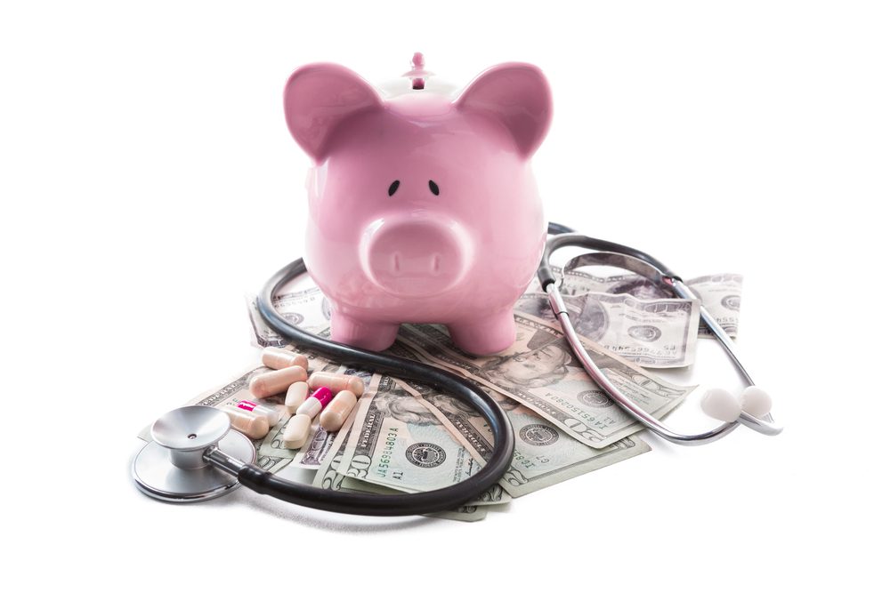 medical costs piggy bank and stethoscope