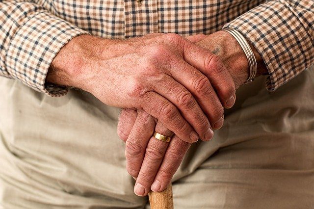 elderly man with a cane